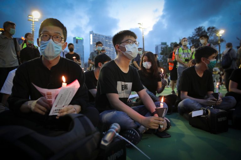 Two dozen Hong Kong activists charged with illegal assembly for Tiananmen Square vigil