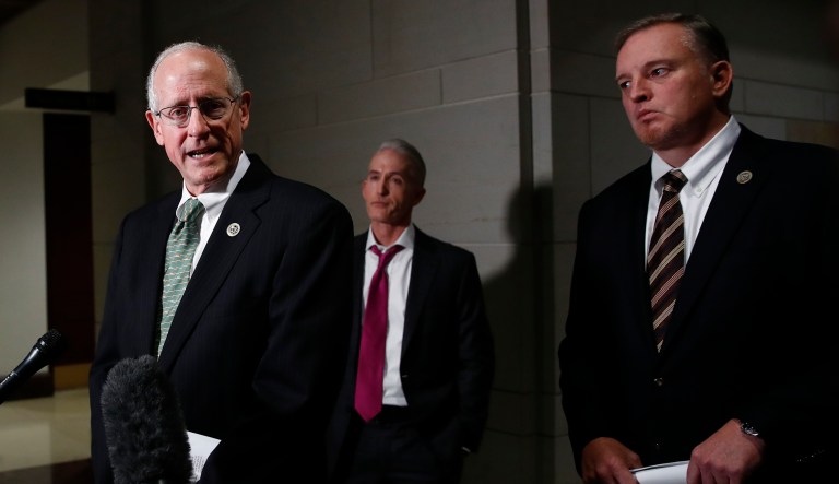 House Intelligence Committee member Rep. Mike Conaway, R-Texas, left, joined by Rep. Tom Rooney, R-Fla., center and Rep. Trey Gowdy, R-S.C., right, speaks to media after a House Intelligence Committee meeting.