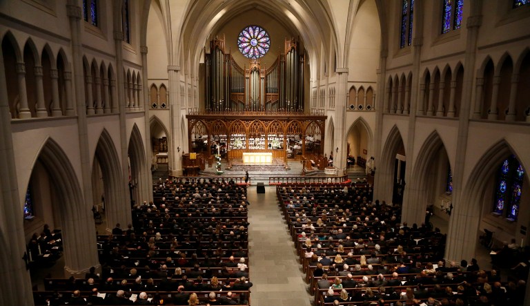 Guests are seated for a funeral for former President George H.W. Bush at St. Martin's Episcopal Church Thursday, Dec. 6, 2018, in Houston.