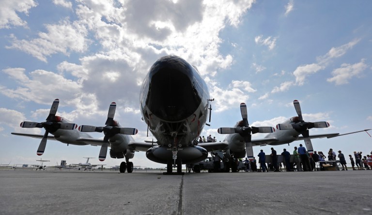 Visitors line up to tour the National Oceanic and Atmospheric Administration's WP-3D Orion turboprop 'Hurricane Hunter' at New Orleans Lakefront Airport in New Orleans, Wednesday, May 21, 2014. The aircraft is  used by scientists on research missions to study various elements of a hurricane, flying through the eye of the storm several times each flight. The plane is also visiting Corpus Christi, Texas, Houston, Tallahassee, Fla.; and Tampa, Fla. 