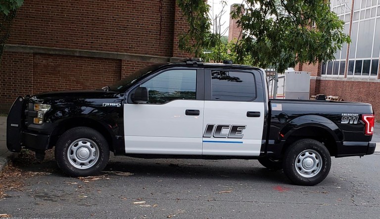 This photo provided by the Princeton, N.J. Police dept. shows a Princeton Police patrol vehicle that has ICE on its door in Princeton, N.J.  Writing on Facebook, the police department in the town that is home to the Ivy League university says the pickup truck underwent repairs and will receive the rest of its decal so it spells POLICE on Friday, Aug. 10, 2018.  The department says its official colors are black and white, while ICE vehicles are white and blue. ICE is the acronym for the U.S. Immigration and Customs Enforcement. 