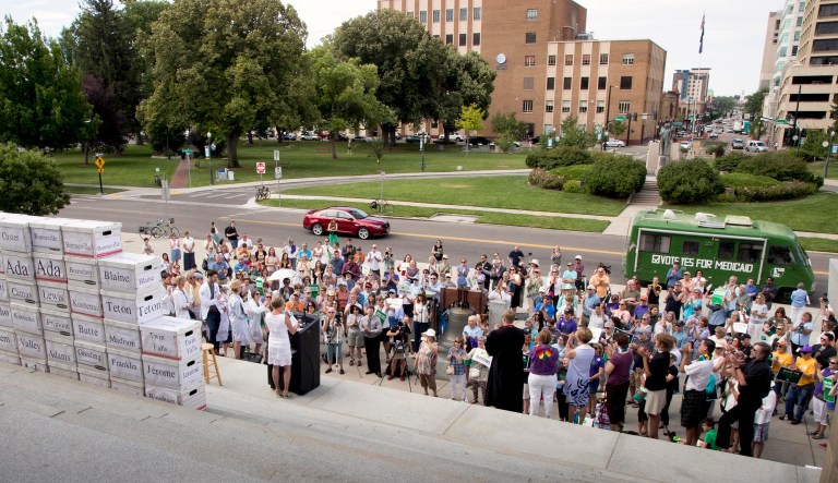 Volunteers from around Idaho belonging to various organizations gather on the steps of the Idaho Capital Building after a signature campaign gathered over 70,000 voter signatures petitioning for an initiative for Medicaid expansion be placed on the November election ballot.