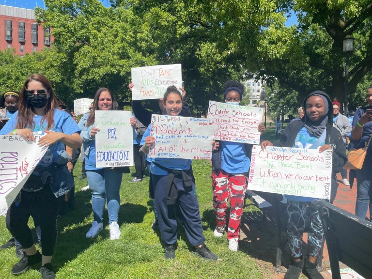 Attendees at a May 11, 2022 rally at the White House in opposition to a proposed regulation restricting how federal charter school funds are disbursed.