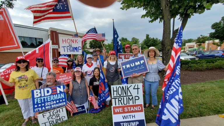Supporters of former President Donald Trump rally in Fairfax, Virginia, ahead of Trump's hearing on Thursday, Aug. 3, 2023. The rally was organized by Stacy Langton.
