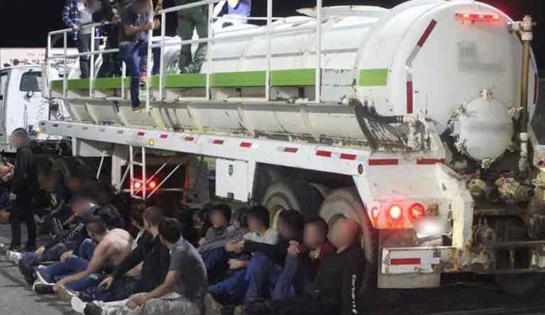 Smugglers caught in Texas trying to transport 50 migrants hidden inside gas tanker