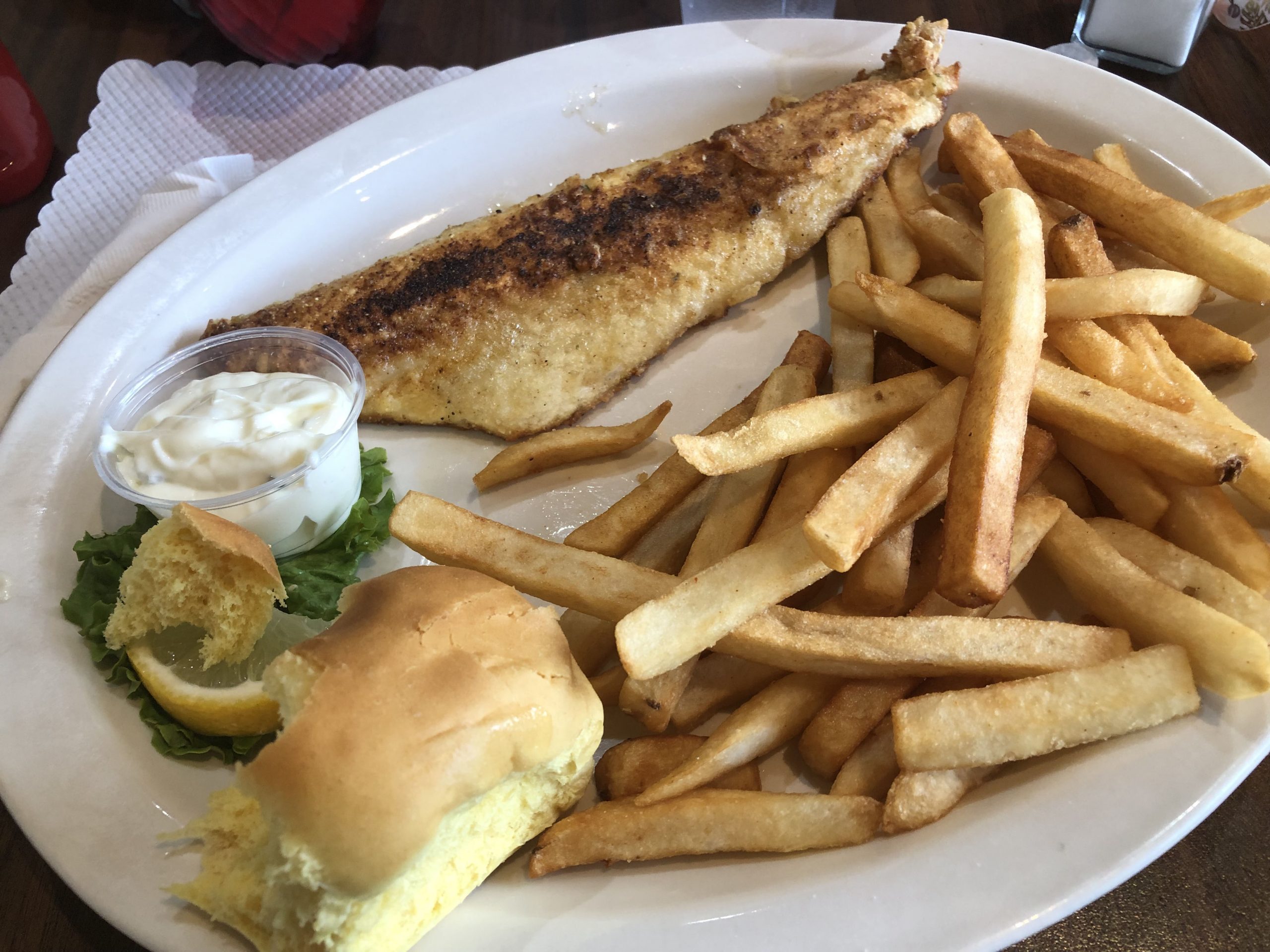 Waupaca, Wisconsin - The Courtside Sports Bar's famous walleye and homemade tartar sauce is seen as part of their Friday fish fry selection.