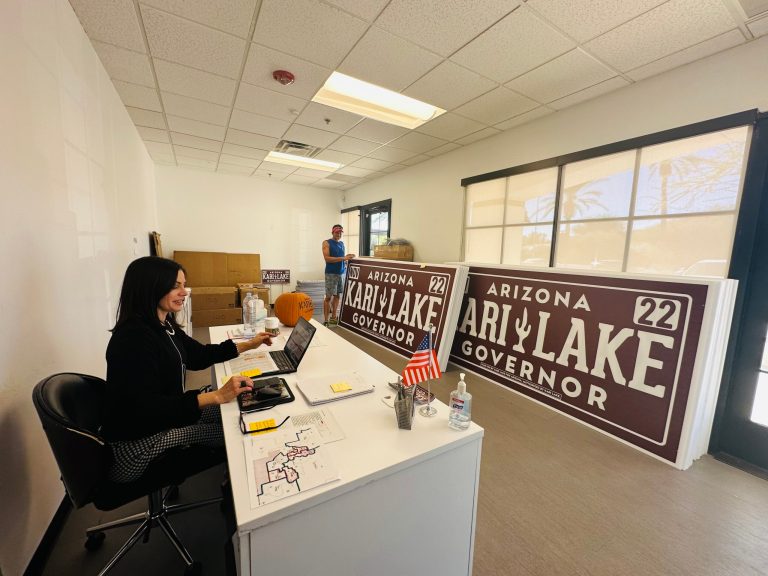Staff and volunteers work at Kari Lake's headquarters in Scottsdale, Arizona on October 27, 2022.