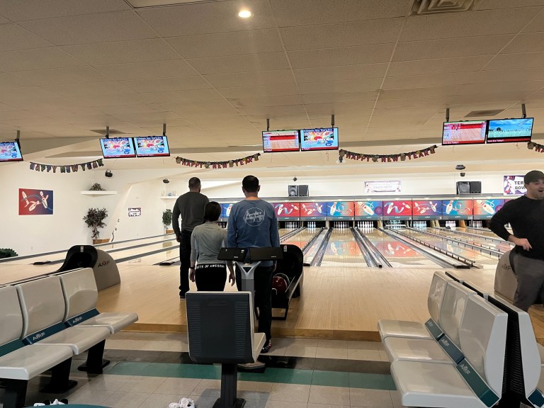 The Nobleman and Reid families from Silver Springs, Maryland, bowling at the Terrace Bowling Center.