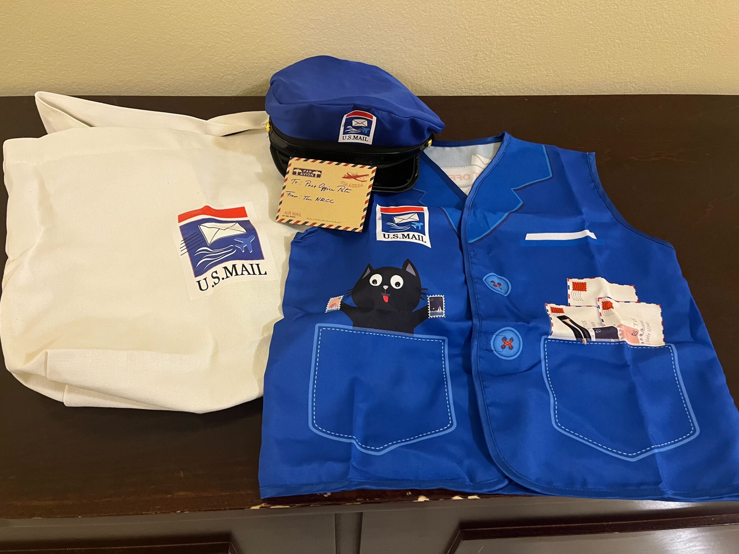 Postman costume delivered to Aguilar