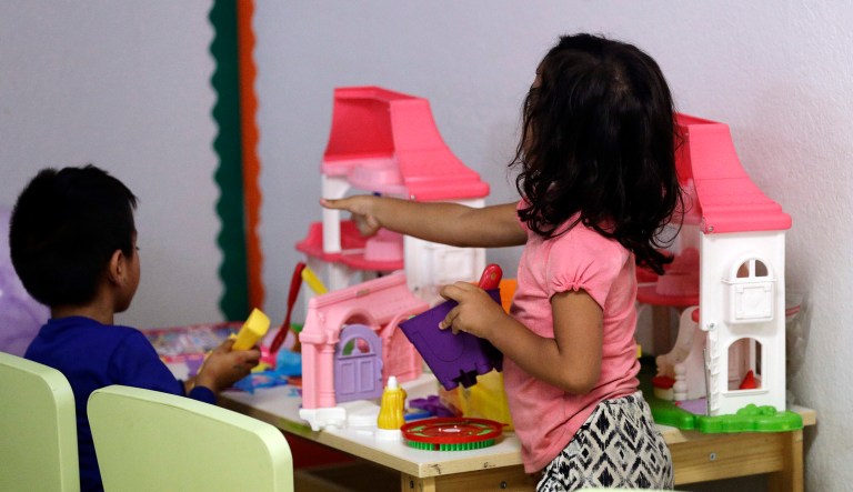 Immigrant children play inside the Catholic Charities of the Rio Grande Valley on Saturday, June 23, 2018, in McAllen, Texas. Families, who have been processed and released by U.S. Customs and Border Protection, wait inside the facility before continuing their journey to cities across the United States.