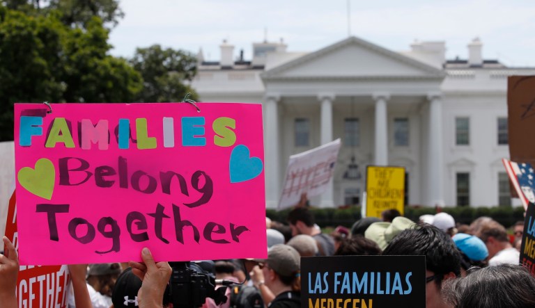 Activists march past the White House to protest the Trump administration's approach to illegal border crossings and separation of children from immigrant parents on June 30, 2018.