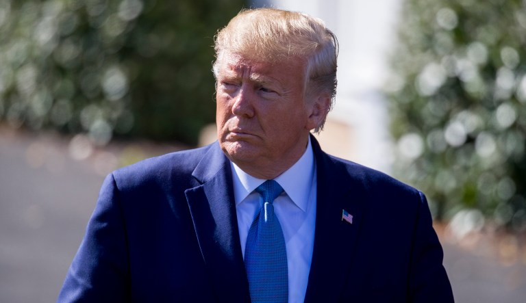 President Donald Trump walks to speak with reporters on the South Lawn of the White House before departing, Wednesday, Oct. 23, 2019, in Washington.
