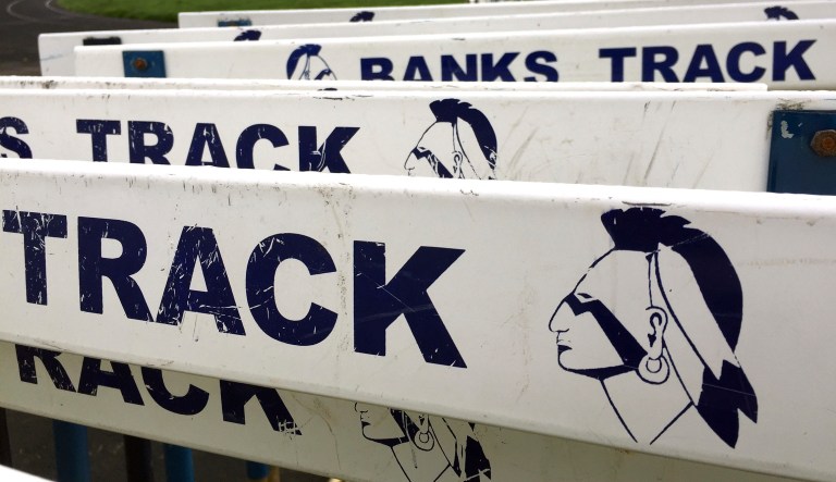 The Banks High School mascot is visible on track hurdles at the school in Banks, Ore., Thursday, March 23, 2017. In Oregon, school districts with Native American mascots must abandon them by July or risk punishment that could include the withholding of state funds.