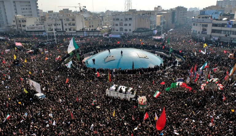 Coffins of Gen. Qassem Soleimani and others who were killed in Iraq by a U.S. drone strike, are carried on a truck surrounded by mourners during a funeral procession at the Enqelab-e-Eslami (Islamic Revolution) square in Tehran, Iran, Monday, Jan. 6, 2020. The processions mark the first time Iran honored a single man with a multi-city ceremony. Not even Ayatollah Ruhollah Khomeini, who founded the Islamic Republic, received such a processional with his death in 1989. Soleimani on Monday will lie in state at Tehran's famed Musalla mosque as the revolutionary leader did before him.