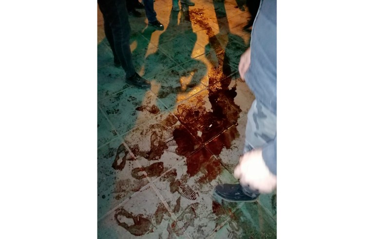 In this photo released by the official website of the office of the Iranian Presidency, President Hassan Rouhani, right, welcomes Director General of International Atomic Energy Agency, IAEA, Rafael Mariano Grossi for their meeting in Tehran, Iran, Wednesday, Aug. 26, 2020.