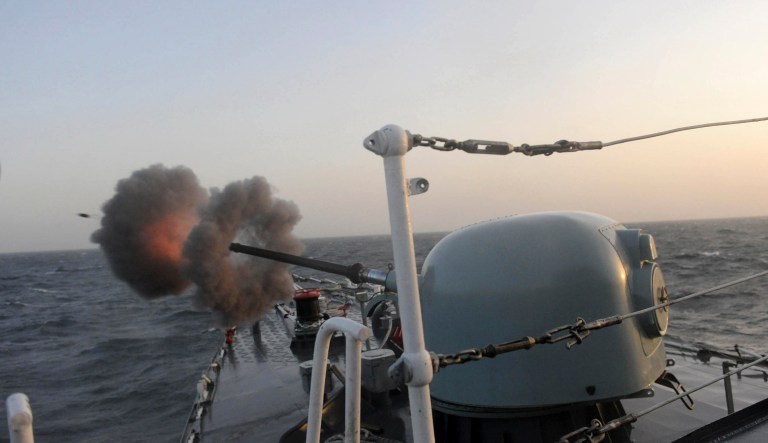 FILE - In this Feb. 21, 2010 file photo, Iran's Jamaran guided-missile destroyer fires during an exercise in the Persian Gulf, off the coast of Iran. Iran has announced the deployment of ship-based missiles that can target shorelines from international waters, and its naval commander said that Islamic Republic warships could someday be cruising near America's Atlantic seaboard.