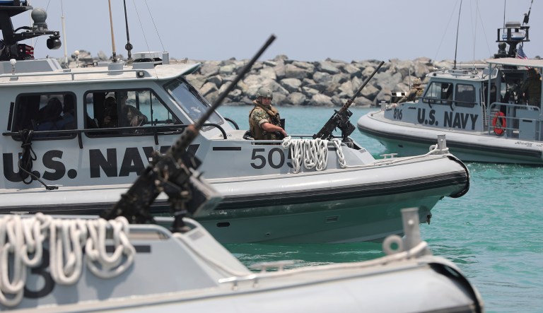U.S. Navy patrol boats carrying journalists to see damaged oil tankers leaves a U.S. Navy 5th Fleet base near Fujairah, United Arab Emirates, Wednesday, June 19, 2019.
