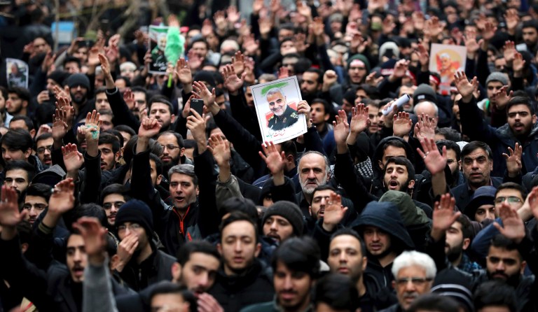 Protesters demonstrate over the U.S. airstrike in Iraq that killed Iranian Revolutionary Guard Gen. Qassem Soleimani in Tehran, Iran, Saturday Jan. 4, 2020. Iran has vowed "harsh retaliation" for the U.S. airstrike near Baghdad's airport that killed Tehran's top general and the architect of its interventions across the Middle East, as tensions soared in the wake of the targeted killing.