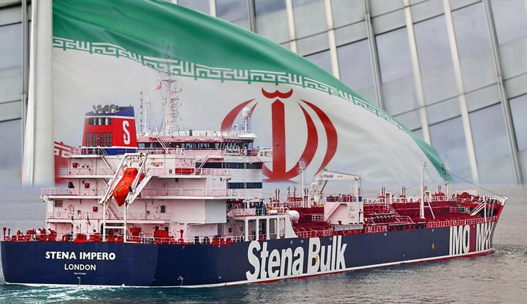 The Stena Impero is seen in the foreground; an Iranian flag is seen in the background.
