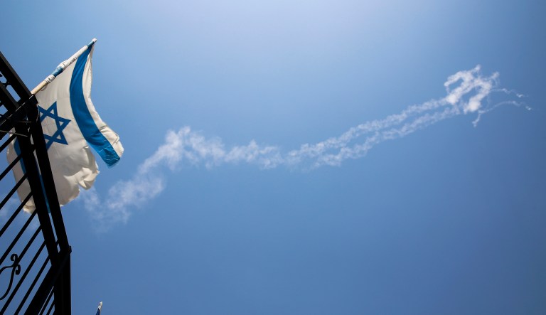 Trails of Patriot missiles are seen in the sky in northern Israel Tuesday, July 24, 2018. Israel shot down a Syrian fighter jet it said had breached its airspace on Tuesday while advancing Syrian government forces retaking territory from rebels reached the Golan Heights frontier for the first time in seven years. The Israeli military said it monitored the advance of the Syrian Sukhoi fighter jet and shot it down with a pair of Patriot missiles after it penetrated Israeli airspace by about 2 kilometers.
