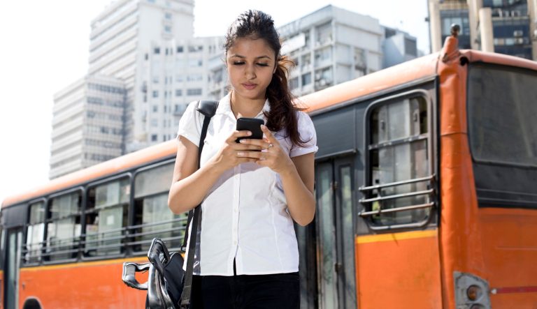 A woman texting on her smartphone.