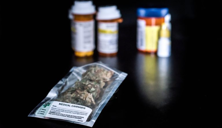 Medical marijuana and pill bottles.