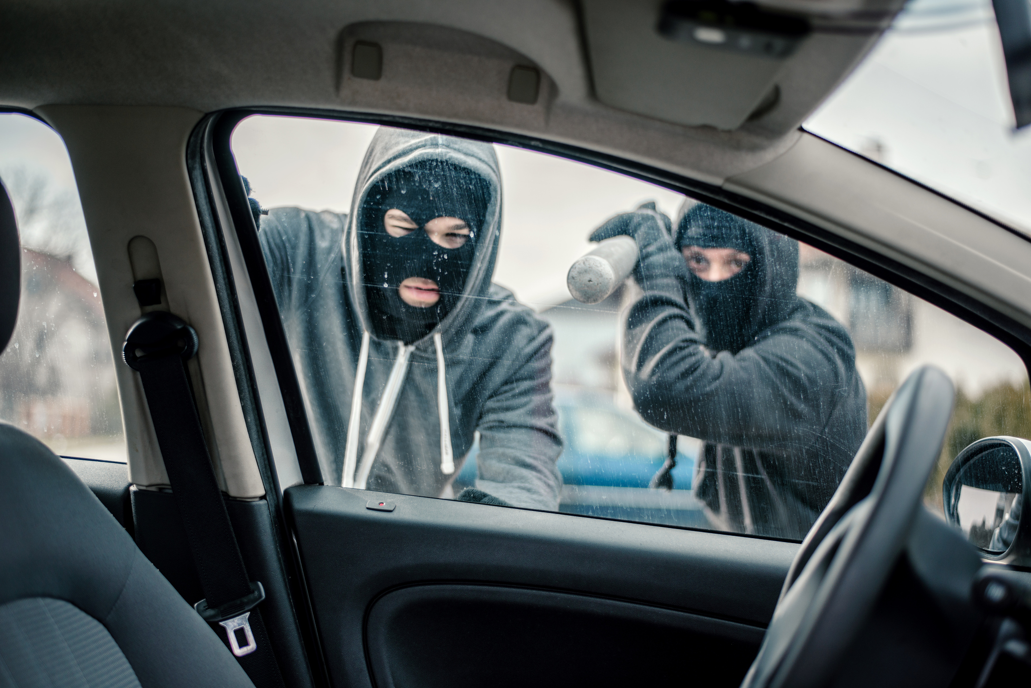Men stealing a car
