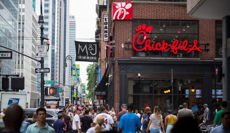 July 15, 2016: Pedestrians walk past a Chick-fil-A restaurant in Midtown Manhattan, New York City.