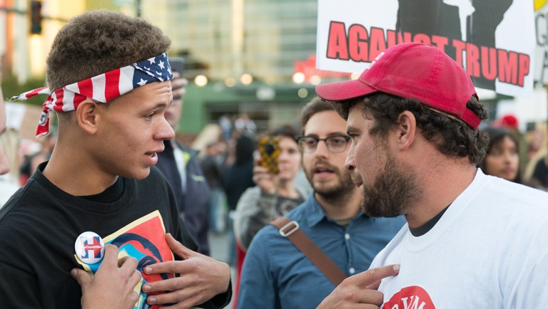 A heated exchange between a Clinton supporter and a Trump supporter.