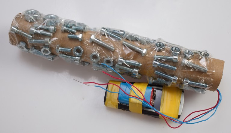 Pipe bomb with cell phone firing device.