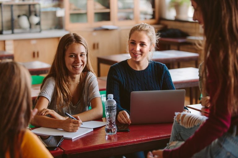Female students chatting during the break between lectures.