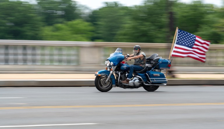 Rolling Thunder Motorcycle rally crosses Memorial Bridge entering Washington DC from Arlington Virginia. The rally is to bring attention to POWs and MIAs of US-involved wars.