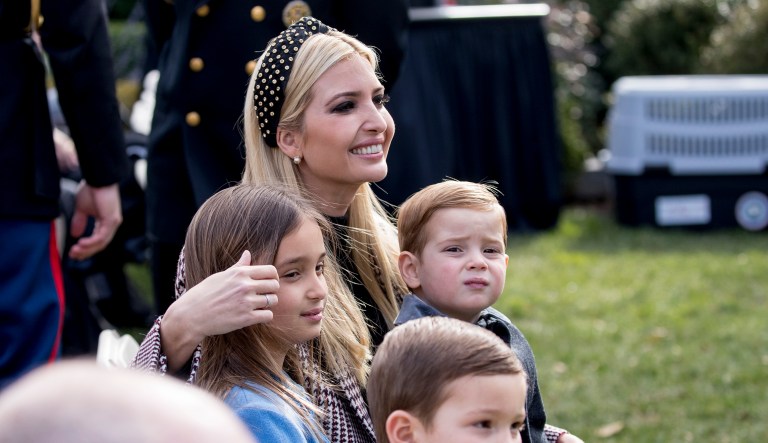 Ivanka Trump, the daughter of President Donald Trump, sits with her children, Joseph Frederick Kushner, bottom center, Arabella Rose Kushner, left, and Theodore James Kushner.