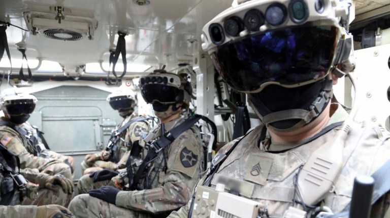 Soldiers don the Integrated Visual Augmentation System Capability Set 3 hardware while mounted in a Stryker in Joint Base Lewis-McCord, Wash.
