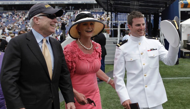 Sen. John McCain, R-Ariz., left, and his wife Cindy, walk with their son Jack after he graduated from the U.S. Naval Academy in Annapolis, Md., Friday, May 22, 2009. 