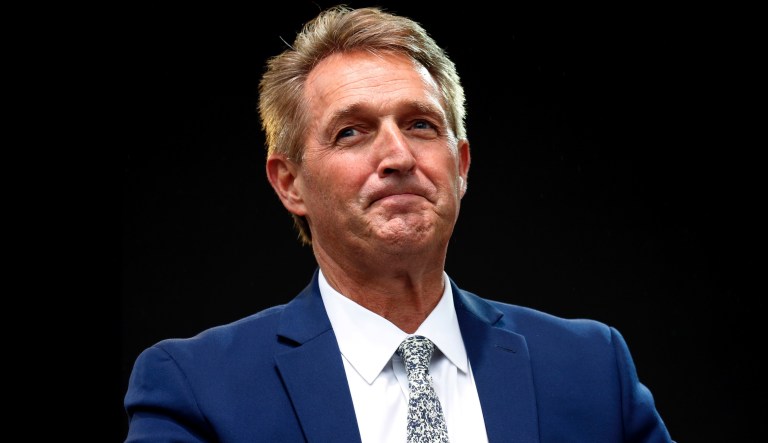 Sen. Jeff Flake, R-Ariz., listens to a question during an appearance at the Forbes 30 Under 30 Summit, Monday, Oct. 1, 2018, in Boston.