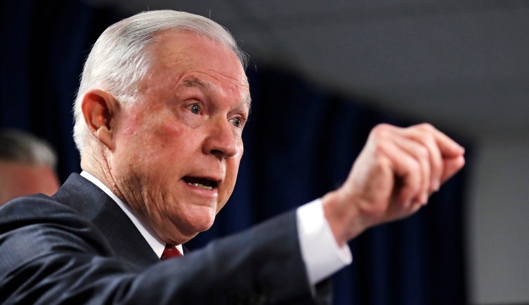 U.S. Attorney General Jeff Sessions gestures during a news conference at the Moakley Federal Building in Boston, Thursday, July 26, 2018. Sessions is defending his top deputy after some Congressional Republicans moved to impeach him. Sessions said Thursday in Boston that he has the "highest confidence" in Deputy Attorney General Rod Rosenstein. He suggested lawmakers instead focus on reforming the nation's immigration system.