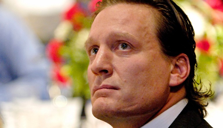 Jeremy Roenick watches his introduction video during induction ceremonies at the U.S. Hockey Hall of Fame in Buffalo, N.Y., on Thursday, Oct. 21, 2010.