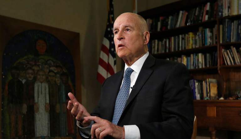Gov. Jerry Brown discusses the goals of the global climate summit he is hosting in San Francisco and legislation he signed directing California to phase out fossil fuels for electricity by 2045 during an interview with The Associated Press, Monday, Sept. 10, 2018, in Sacramento, Calif. Brown's climate summit begins in Wednesday, Sept. 12.