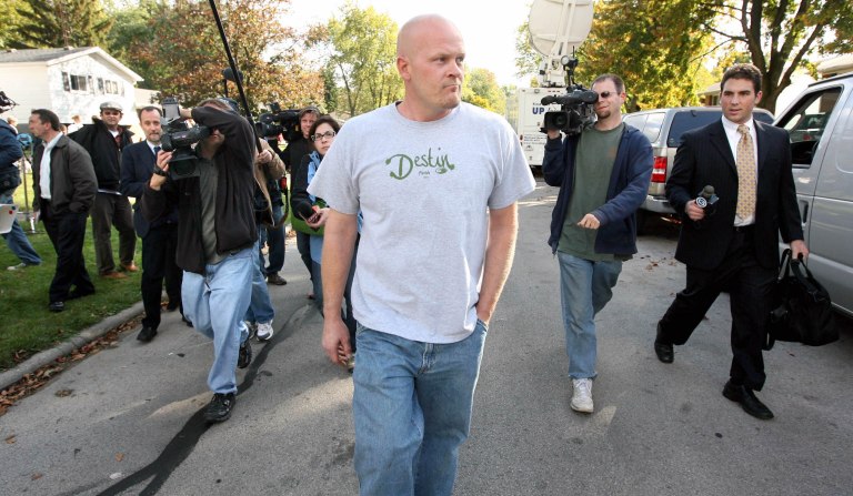 Joe Wurzelbacher, aka, Joe The Pumber, walks to a neighbors home with a national press trailing him from his home in Holland, Ohio, Thursday afternoon October  16, 2008. 
