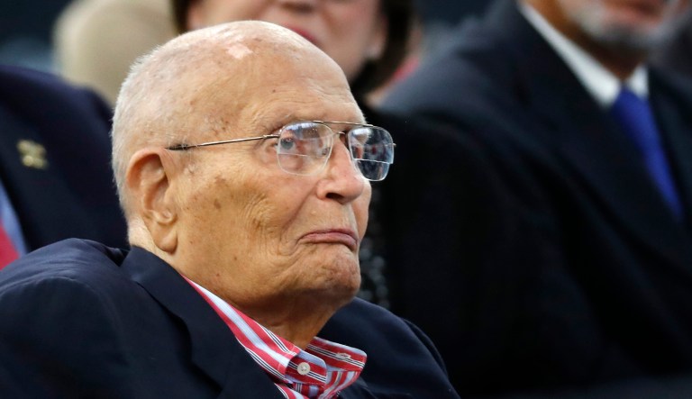 FILE - In this Oct. 19, 2016, file photo, former U.S. Rep. John Dingell, D-Mich., listens to Democratic vice presidential candidate Sen. Tim Kaine, D-Va. speak during a campaign stop in Detroit. Dingell is in a Detroit-area hospital after suffering a heart attack early Monday, Sept. 17, 2018. 
