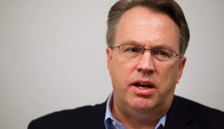 John Williams, president of the Federal Reserve Bank of San Francisco, is interviewed by The Associated Press in Washington, Friday, Oct. 30, 2015. Williams cautioned that the Fed has yet to decide when to raise interest rates even though it issued a statement this week that said a rate hike was possible in December.