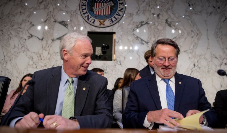 Chairman Ron Johnson, R-Wis., left, and Ranking Member Sen. Gary Peters., D-Mich., right, arrive for a Senate Homeland Security Committee hearing on Capitol Hill in Washington, Tuesday, Nov. 5, 2019.                                                                    