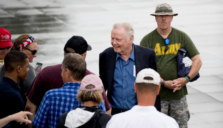 Actor Jon Voight greets visitors before President Donald Trump's Independence Day celebration in front of the Lincoln Memorial, Thursday, July 4, 2019, in Washington.
