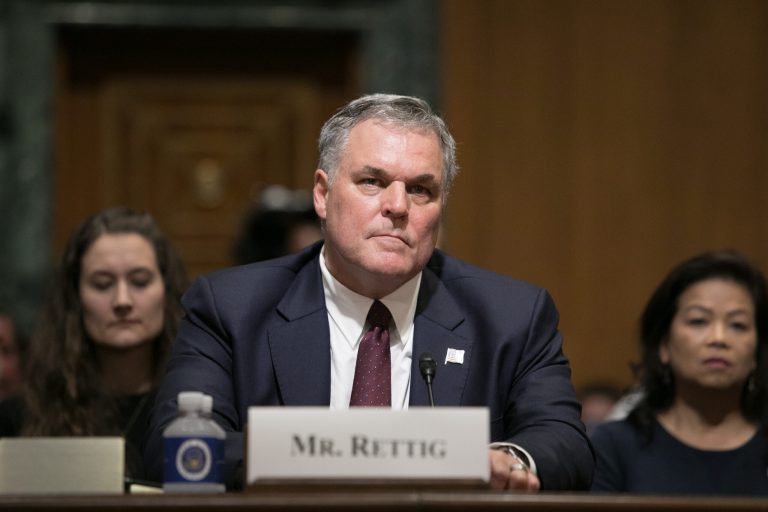 Charles Rettig arrives at a Senate Finance Committee hearing  on his nomination for Internal Revenue Service Commissioner, Thursday, June 28, 2018, on Capitol Hill.  