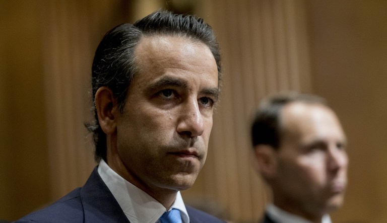 Justin Muzinich, U.S. deputy Treasury secretary nominee for U.S. President Donald Trump, listens during a Senate Finance Committee confirmation hearing in Washington, D.C., U.S., on Thursday, July 26, 2018. Muzinich, a former Morgan Stanley banker and adviser to Jeb Bush's 2016 campaign who joined Steven Mnuchin's team in March as a counselor, helped craft the administration's tax-cut plan, a signature achievement of the president.
