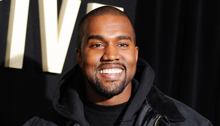 Co-producer Kanye West attends the premiere of "Top Five" at the Ziegfeld Theatre on Wednesday, Dec. 3, 2014, in New York.