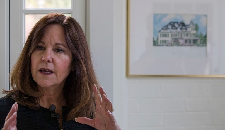 Karen Pence, talks about the watercolor she did as she gives a tour of the holiday decorations at the Vice President's residence, Thursday, Dec. 6, 2018, in Washington.