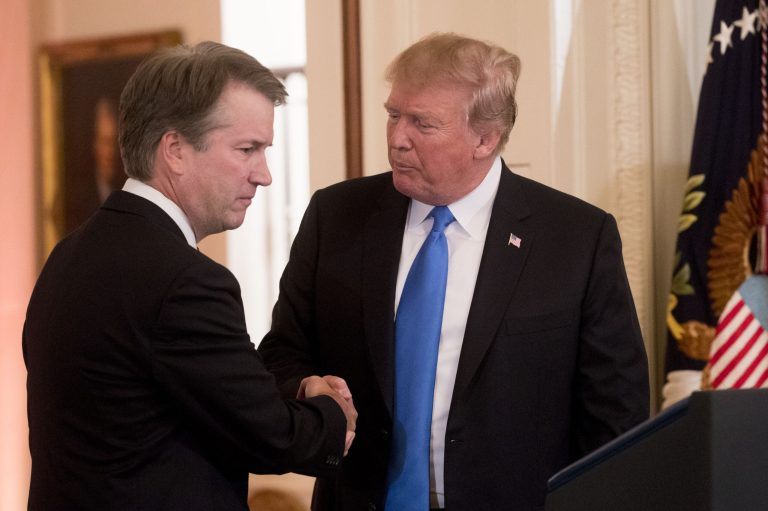 U.S. President Donald Trump, right, shakes hands with Brett Kavanaugh, appeals court judge, after being nominated as an associate justice of the U.S. Supreme Court by Trump during a ceremony in the East Room of the White House in Washington, D.C., U.S., on Monday, July 9, 2018. TrumpÂ said he would nominate Kavanaugh for a seat on the U.S. Supreme Court, a choice that could create the most conservative court in generations and threaten landmark rulings including the Roe v. Wade abortion-rights decision.