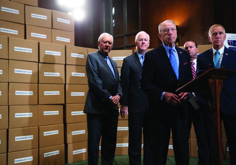 From left, Sen. Orrin Hatch, R-Utah, Sen. John Cornyn, R-Texas, Senate Judiciary Chairman Chuck Grassley, R-Iowa, Sen. Mike Lee, R-Utah, and Sen. Thom Tillis, R-N.C., hold a news conference to refute Senate Democrats who are intensifying their fight over documents related to Supreme Court nominee Brett Kavanaugh's stint as staff secretary at the White House, on Capitol Hill in Washington, Thursday, Aug. 2, 2018. The GOP members of the Judiciary Committee used a wall of empty boxes to dramatize the amount of documents. (AP Photo/J. Scott Applewhite)